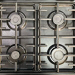 CUISINIERE ENDURO 4FEUX 6X60 A GAZ 2BOUTTONS CONTROLE ALLUMAGE ELECTRIQUE GRIS AFS6040G