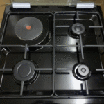 CUISINIERE HAIER 4FEUX 60X60 3FEUX GAZ 1FEUX ELECTRIQUE + FOUR ELECTRIQUE GRIS NOIR HCR2031EESB